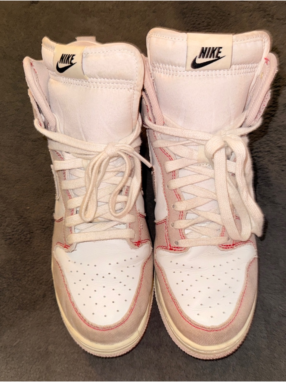Nike Women's White High-Top Sneakers with Pink Stitching